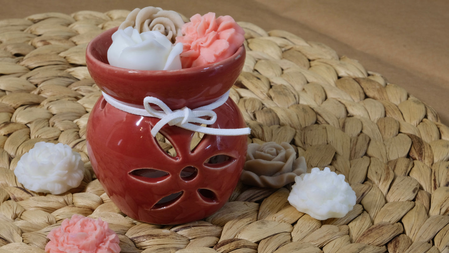Pink wax burner melt with small flower candles