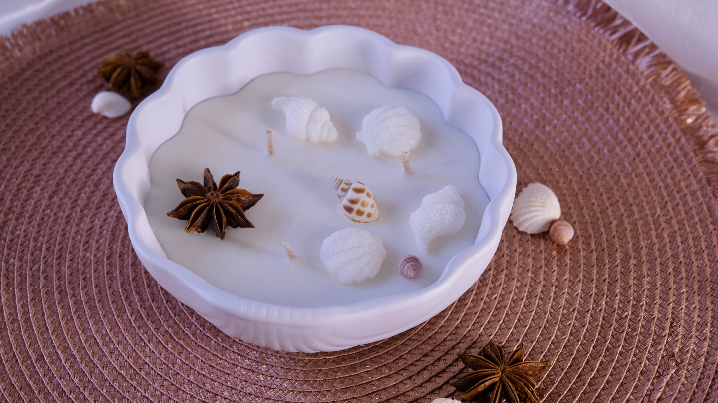 big white shell candle jar with shell decoration
