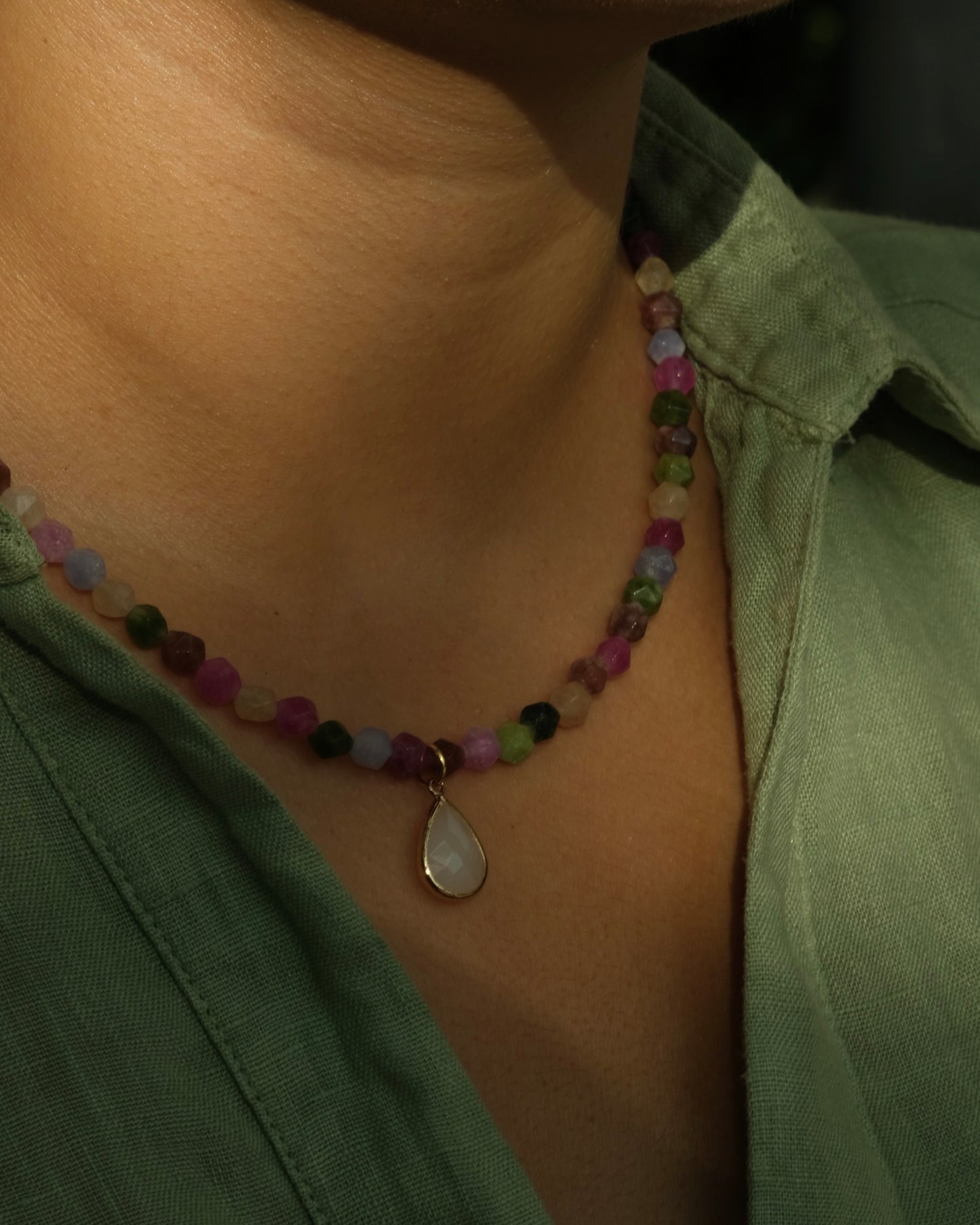 colorful beaded necklace with teardrop stone